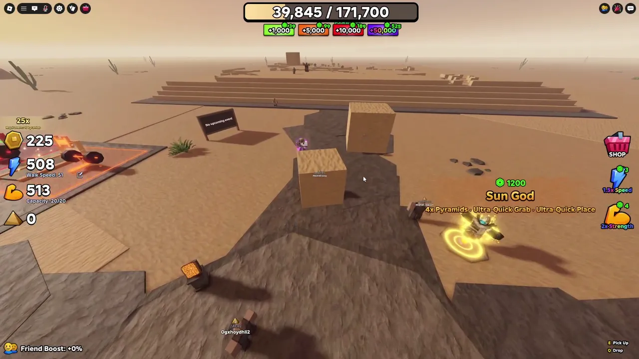 Carrying blocks across the sand towards the pyramid.